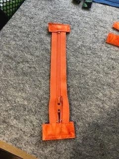 Photo of Tabs sewn to Zip